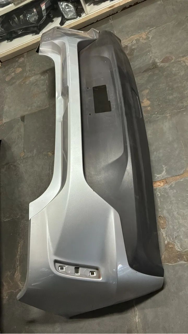 Pára-choque traseiro Onix com moldura - Peças para carros, vans e