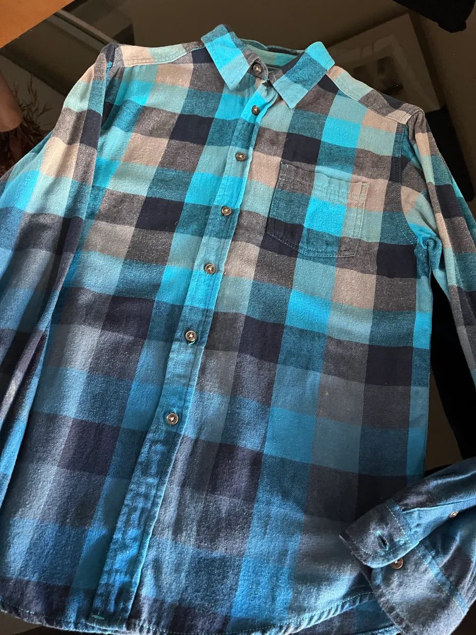 Camisa flanelada xadrez azul e preta 