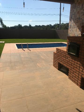 Aluguel de casa com piscina, condomínio fechado, área de lazer, lago e casa nunca habitada - Foto 8