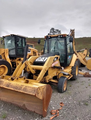 Retro Escavadeira Caterpillar 2014