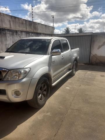 Toyota Hilux vendo e troca em carro de menor valor carro comprador zero único dono - Foto 7