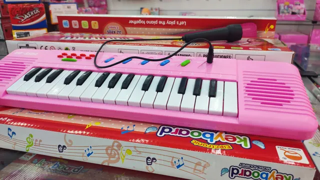 Piano Eletrônico Teclado Infantil Com Microfone Suporte Rosa - Ri