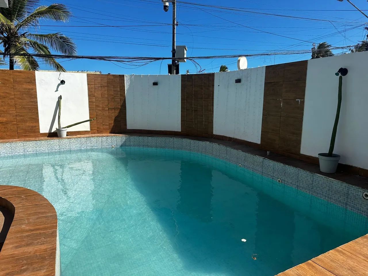 Area com piscina para revéillon com suíte individuais