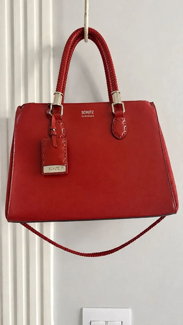 Bolsa Schütz em couro