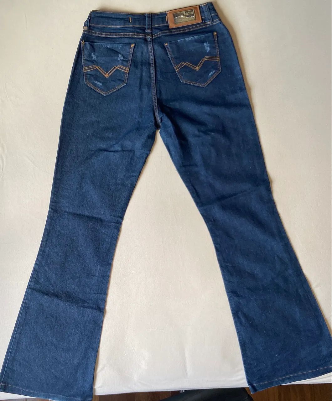 Calça jeans boca de sino 42 - Foto 4