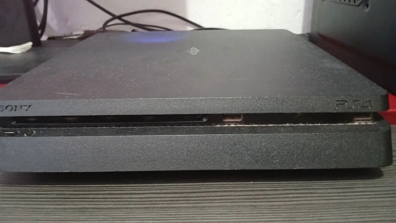 Ps4 slim com 410 Gb com ótimo estado 