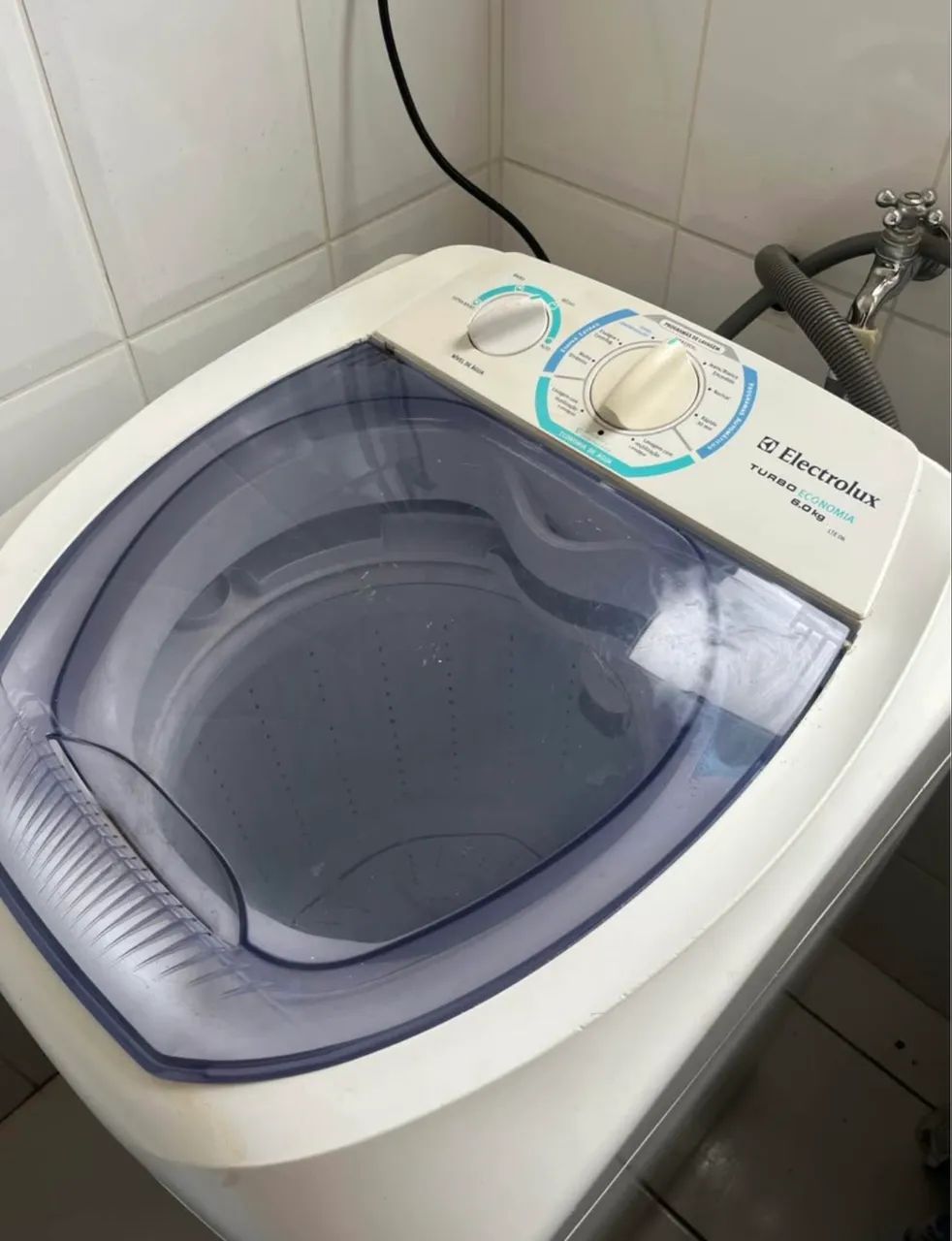 Máquina de lavar com defeito