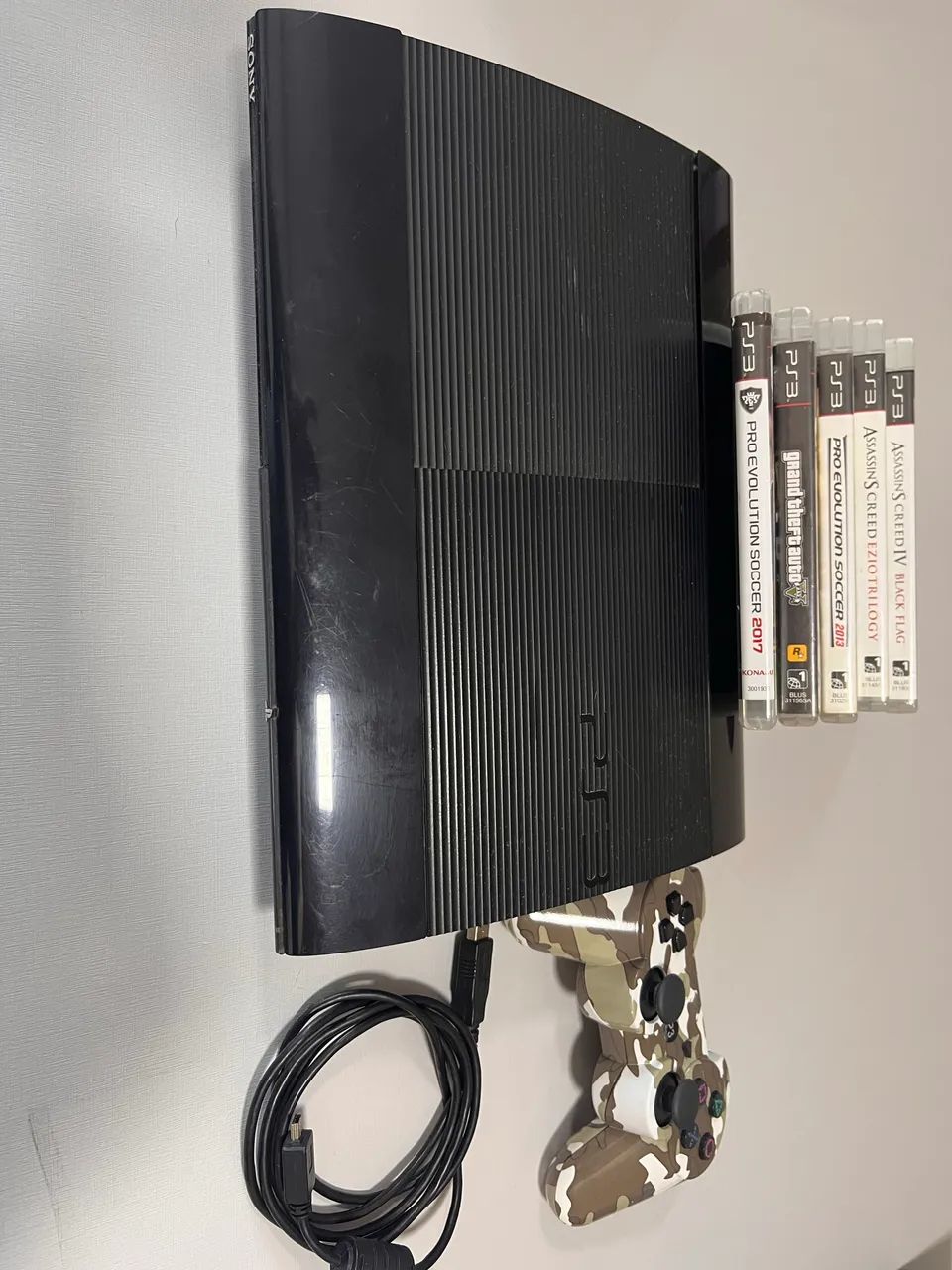 PS3 Super Slim + 5 jogos - Foto 2