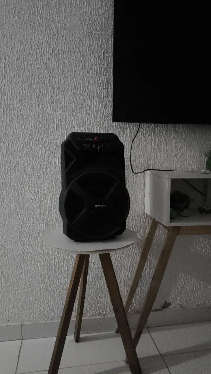 Vendo caixinha de som pega microfone nova mal usada