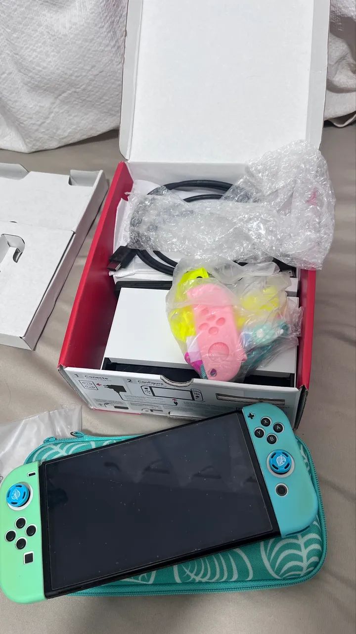 Nintendo Switch OLED impecável + caixa e acessórios - Foto 5