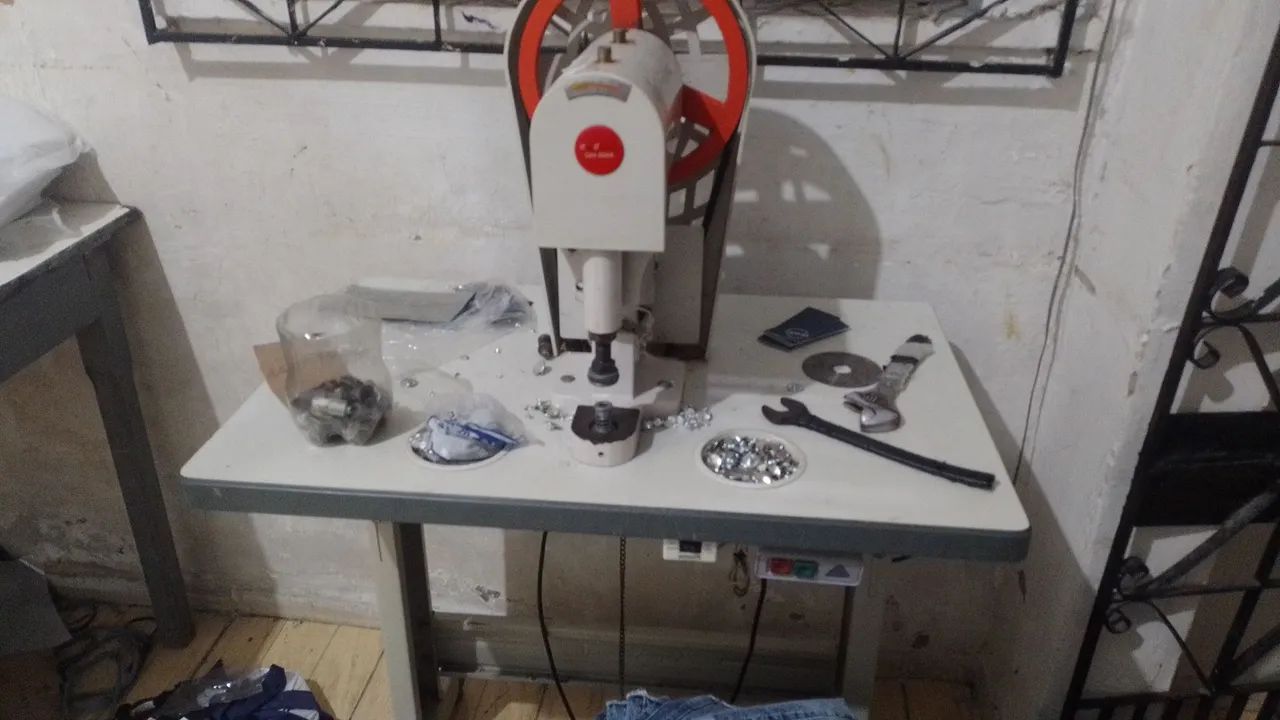 Máquina de botao