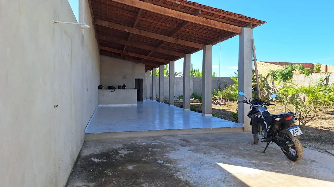 Lote com casa pronta 
