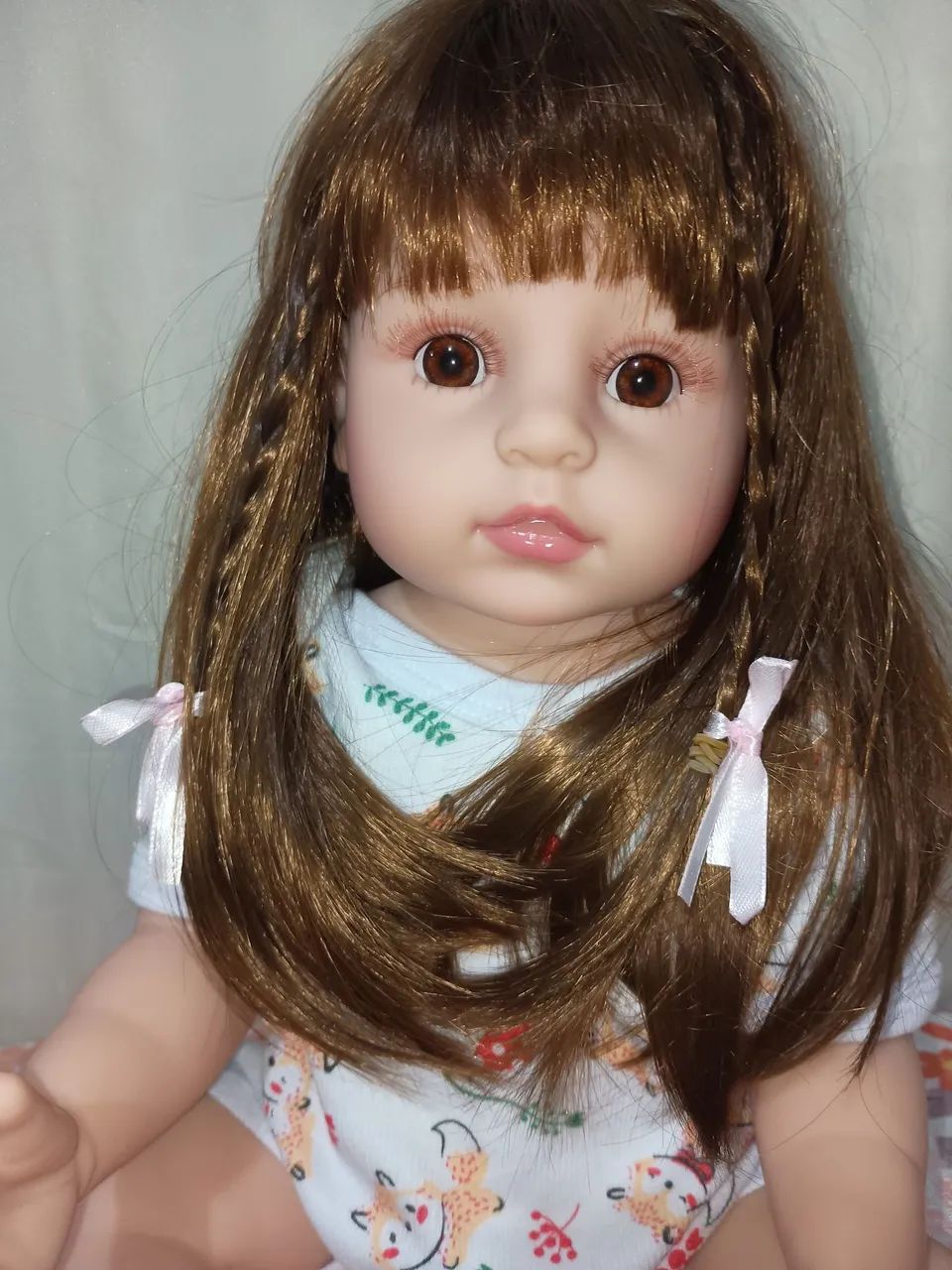 Boneca Reborn menina de trancinhas  - Foto 3