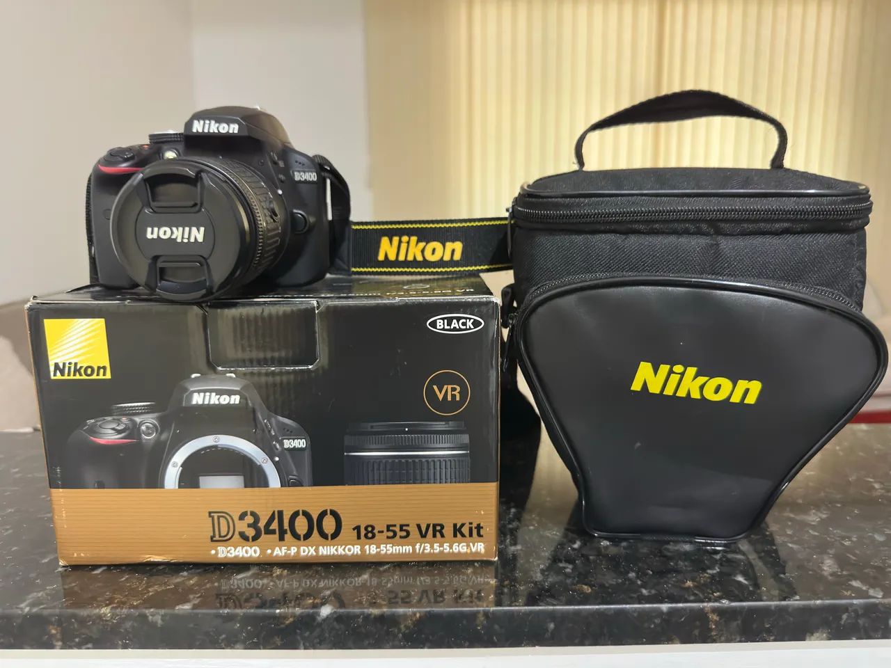 Câmera Nikon D3400 NA CAIXA com lente e acessórios + BRINDE