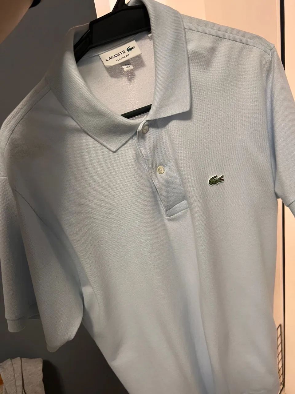Polo Lacoste original, azul bebê tamanho M