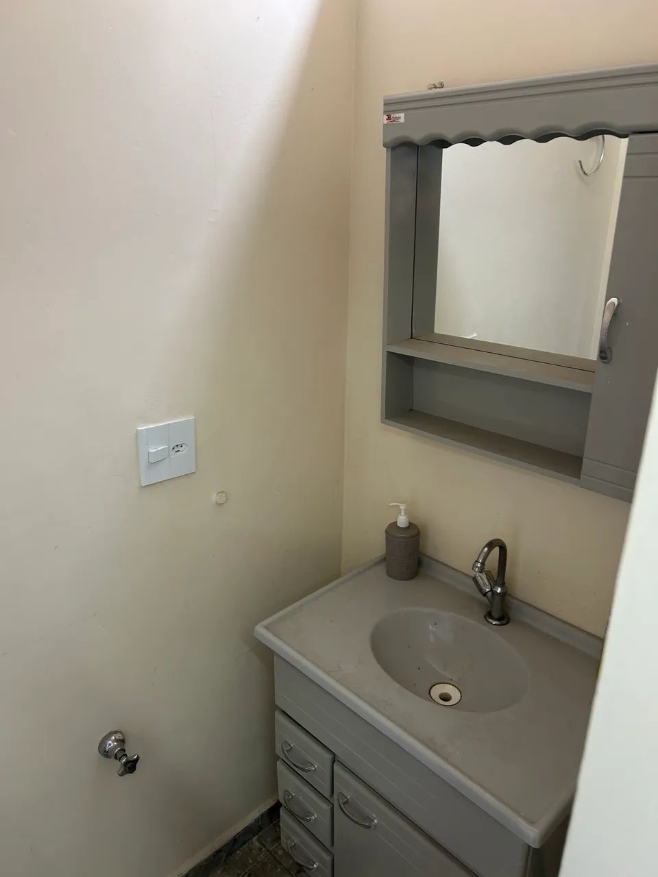 Bathroom Sink, Cabinet, and Mirror