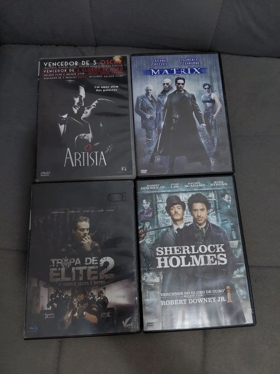 Coleção o artista, tropa de elite 2, sherlock holmes e matrix