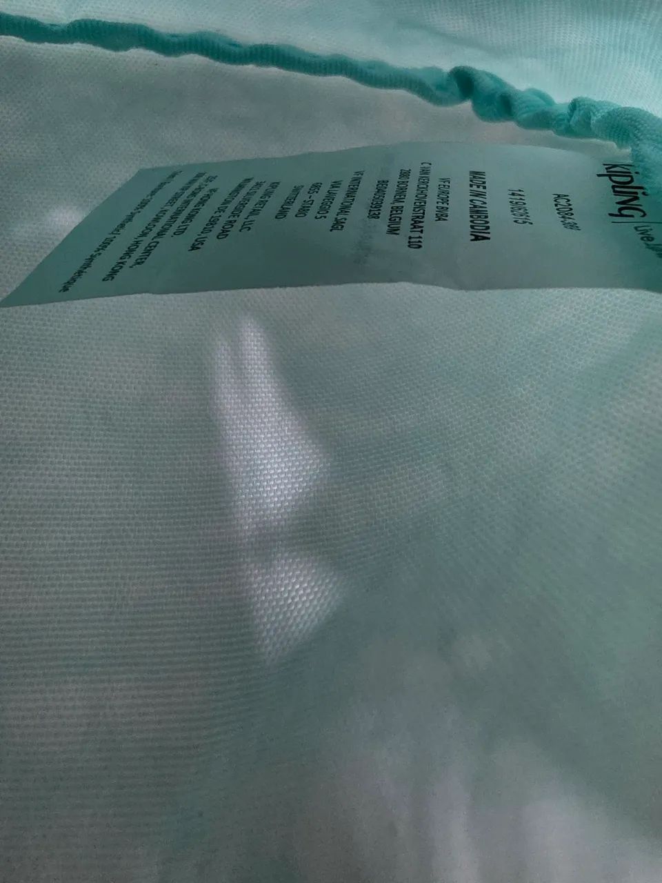 Bolsinha de mão verde água Kipling Original - Foto 4