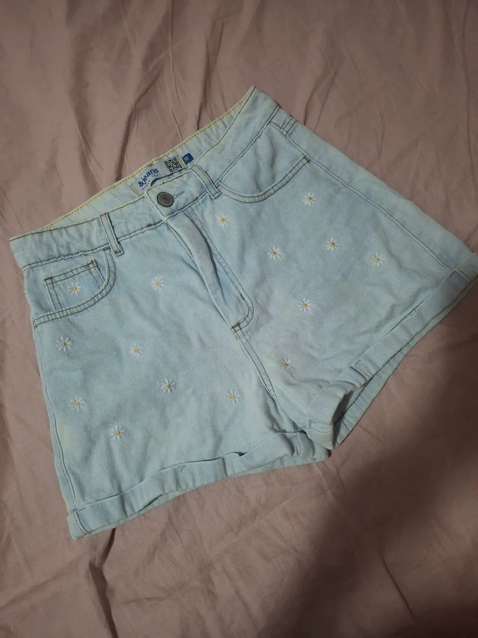 Short jeans de margaridas C&A