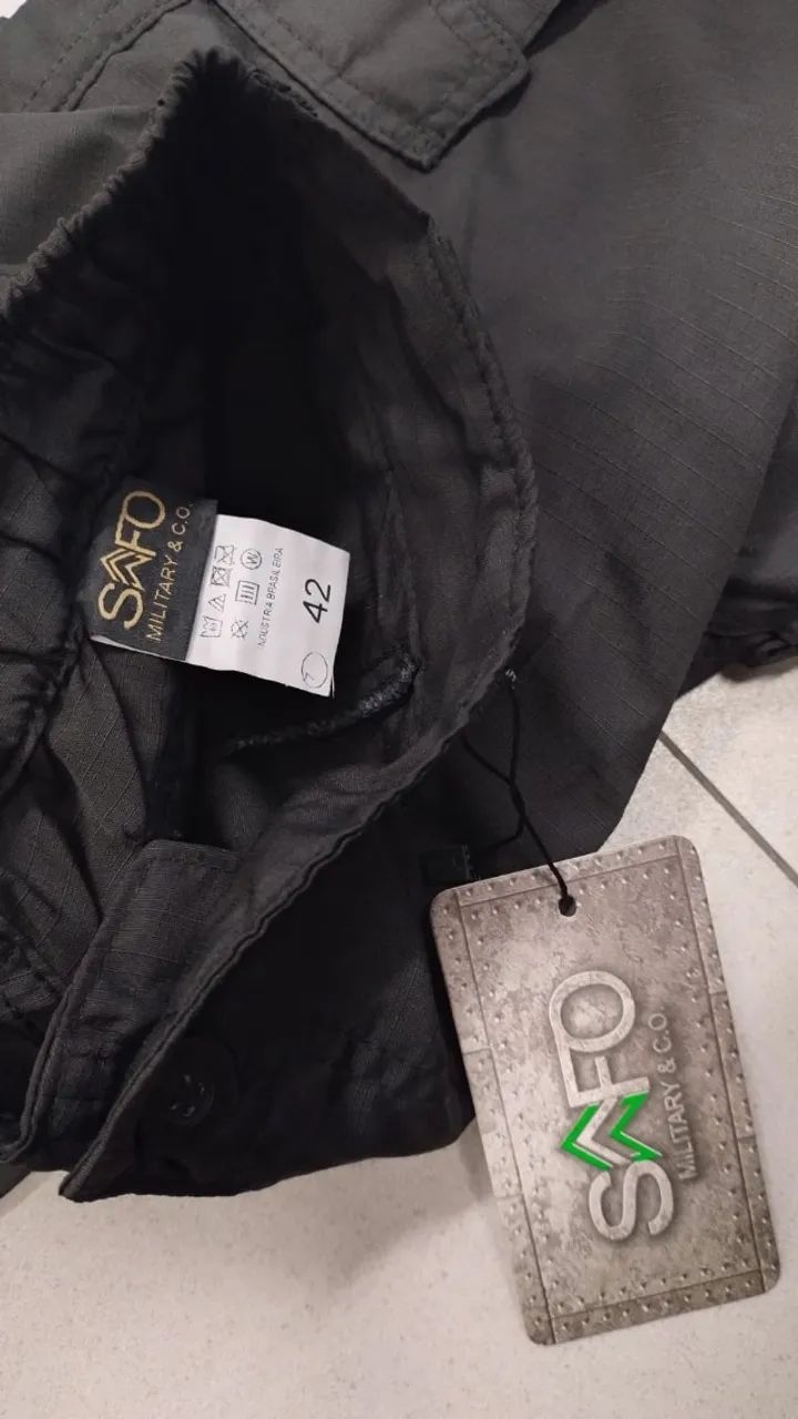 Calça tática preta, modelo tactel (tecido sintético) , transforma em bermuda, tamanho 42 - Foto 4