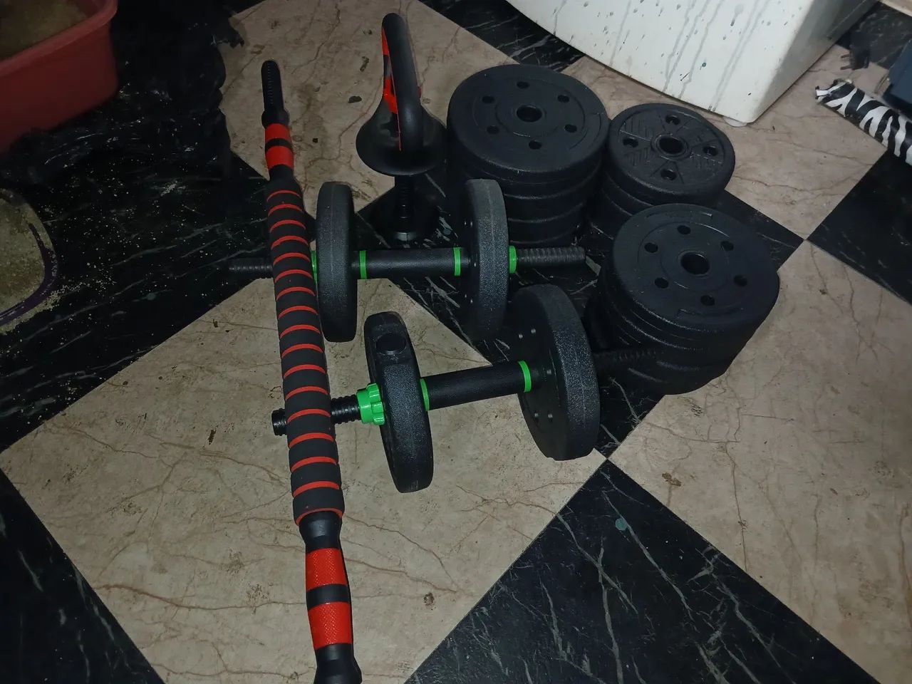 conjunto de halteres  e anilhas 