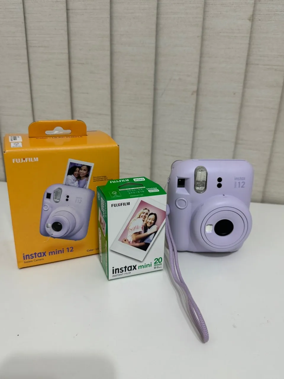 Câmera Instax Mini 12 Lilás + 23 filmes - Nova