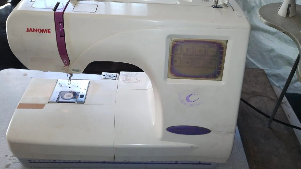 máquina de bordar Janome 300E