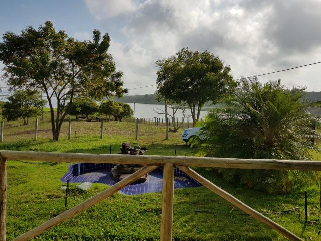 Bela fazendinha às margens da represa " Pedra do Cavalo" com casa boa - Foto 12