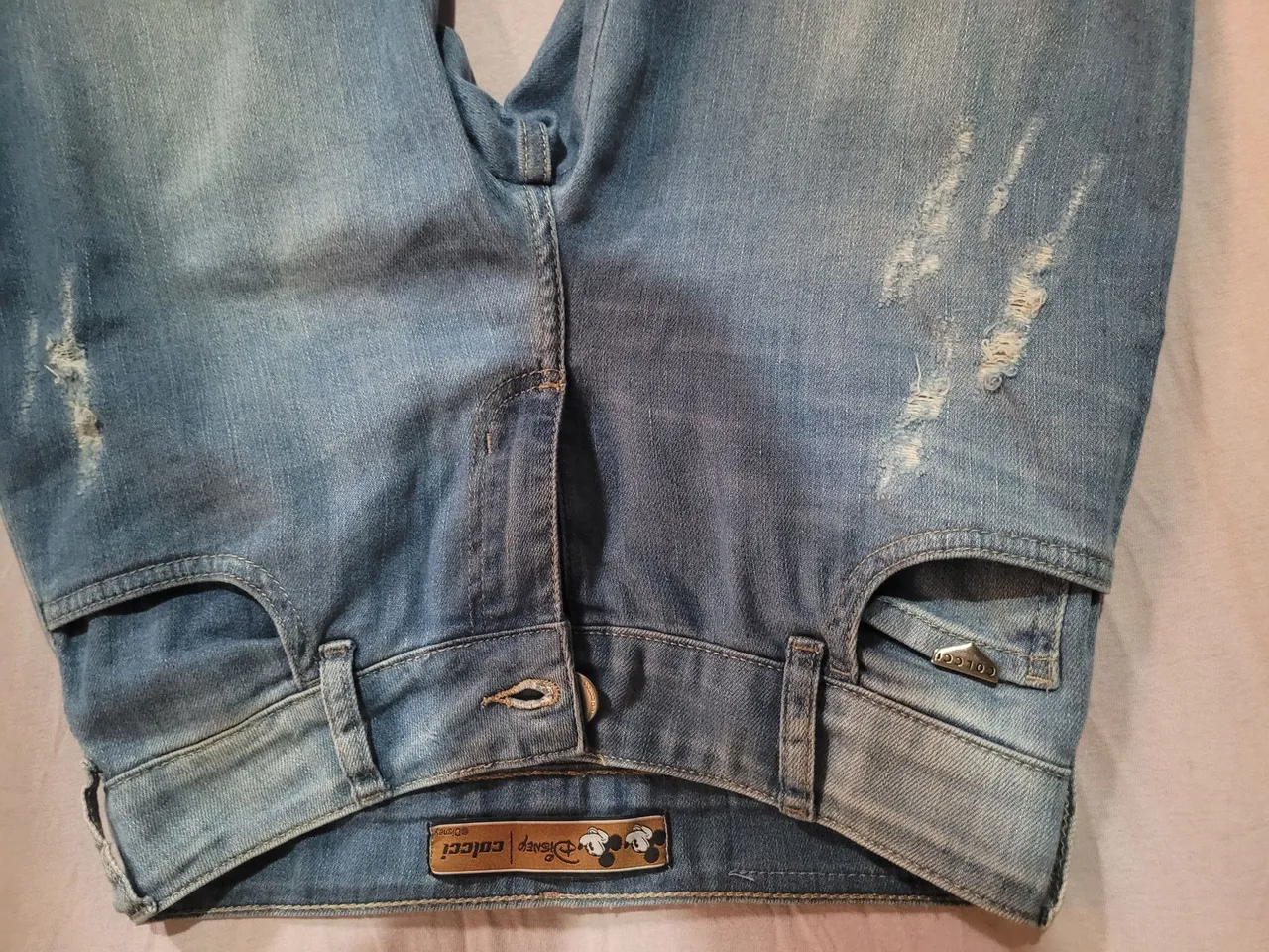 Calça Jeans Destroyed Disney Coleção