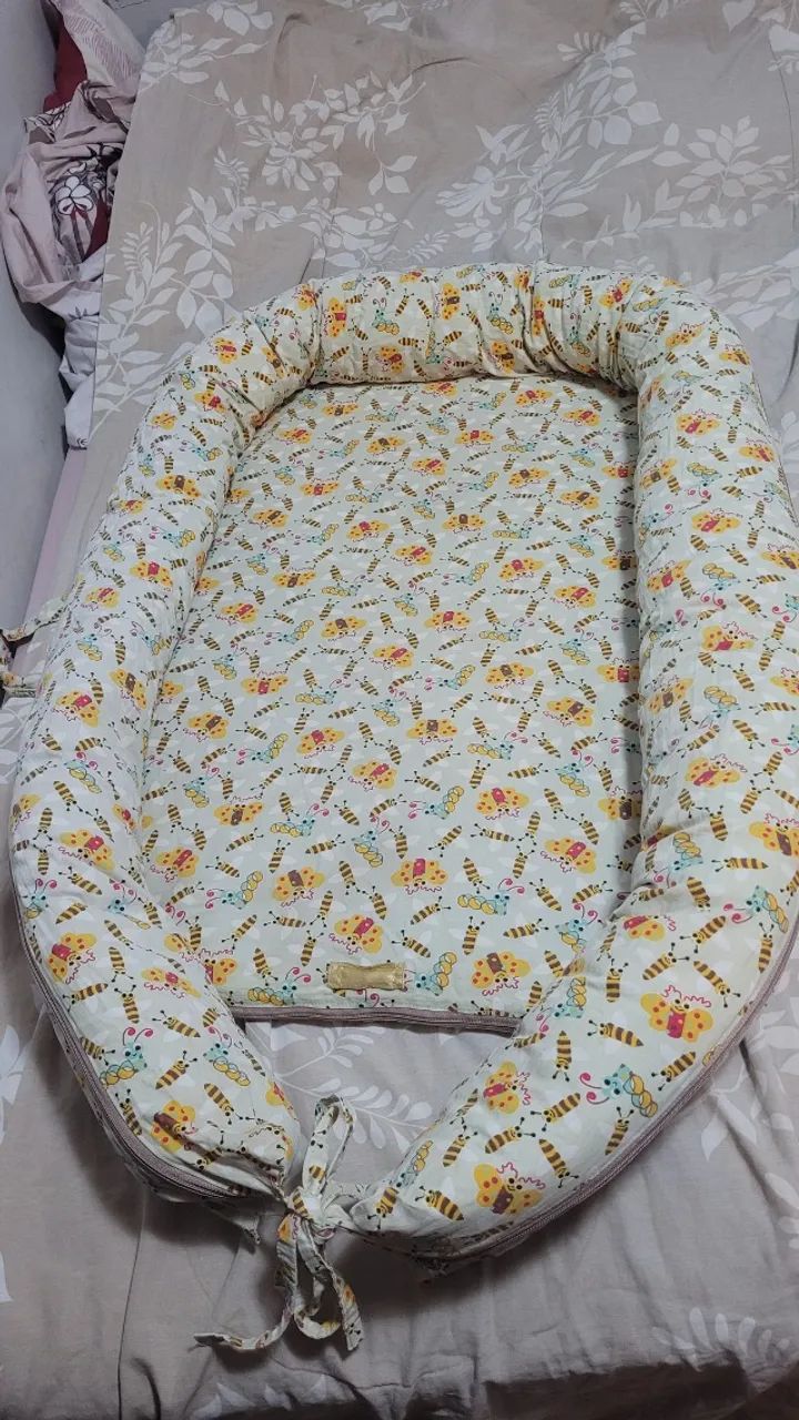 Ninho redutor de berço 