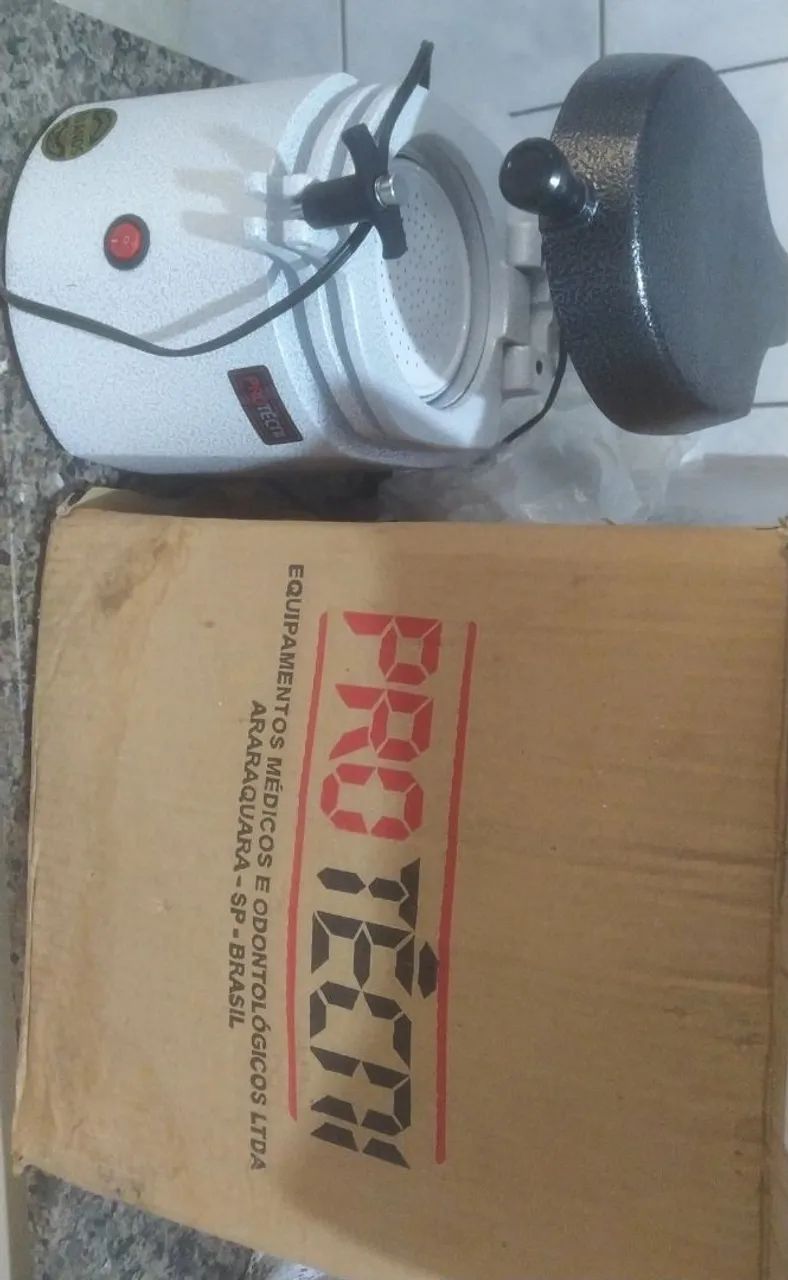 Plastificadora de placas odontológicas 