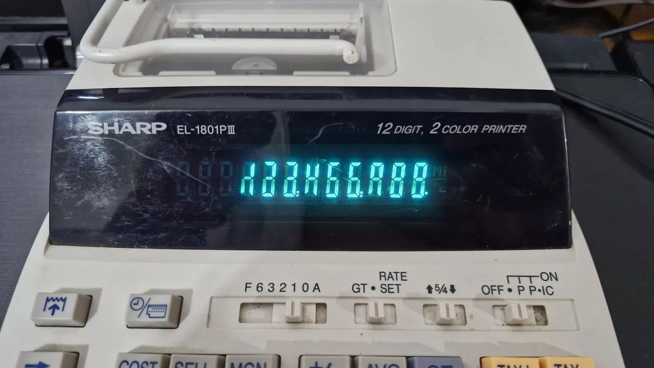 Calculadora de impressão Sharp EL-1801-PIII 120v com defeito no display