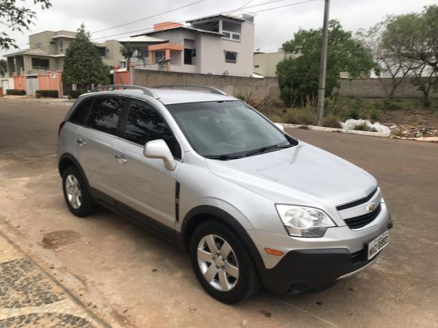 Vendo GM Captiva prata 2010/11, completíssima, muito conservada
