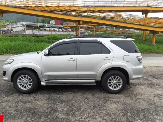 Toyota hilux sw4 sr top flex com gnv ano 2014 - Foto 5