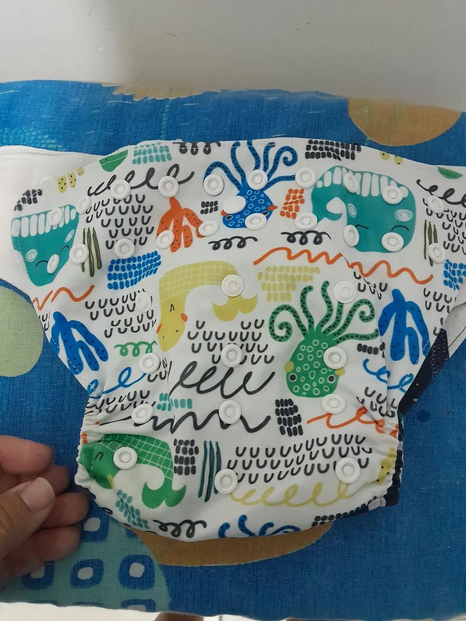 7 fralda reutilizável na foto só tem 6 mais ficou faltado 1 amarela  - Foto 6