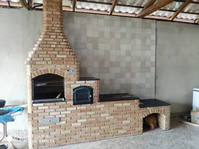 Churrasqueira com fogão a lenha e forno 