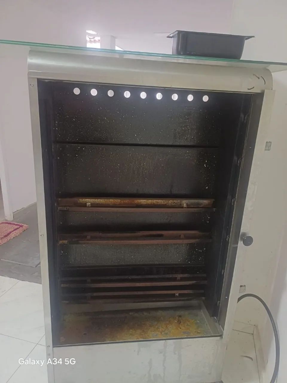Máquina de assar frango semi nova 