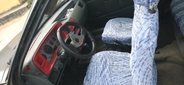 Troco Escort hobby por um de quatro porta