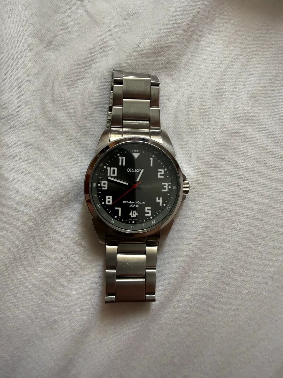 Relógio Orient a pilha com pulseira de metal.  - Foto 4