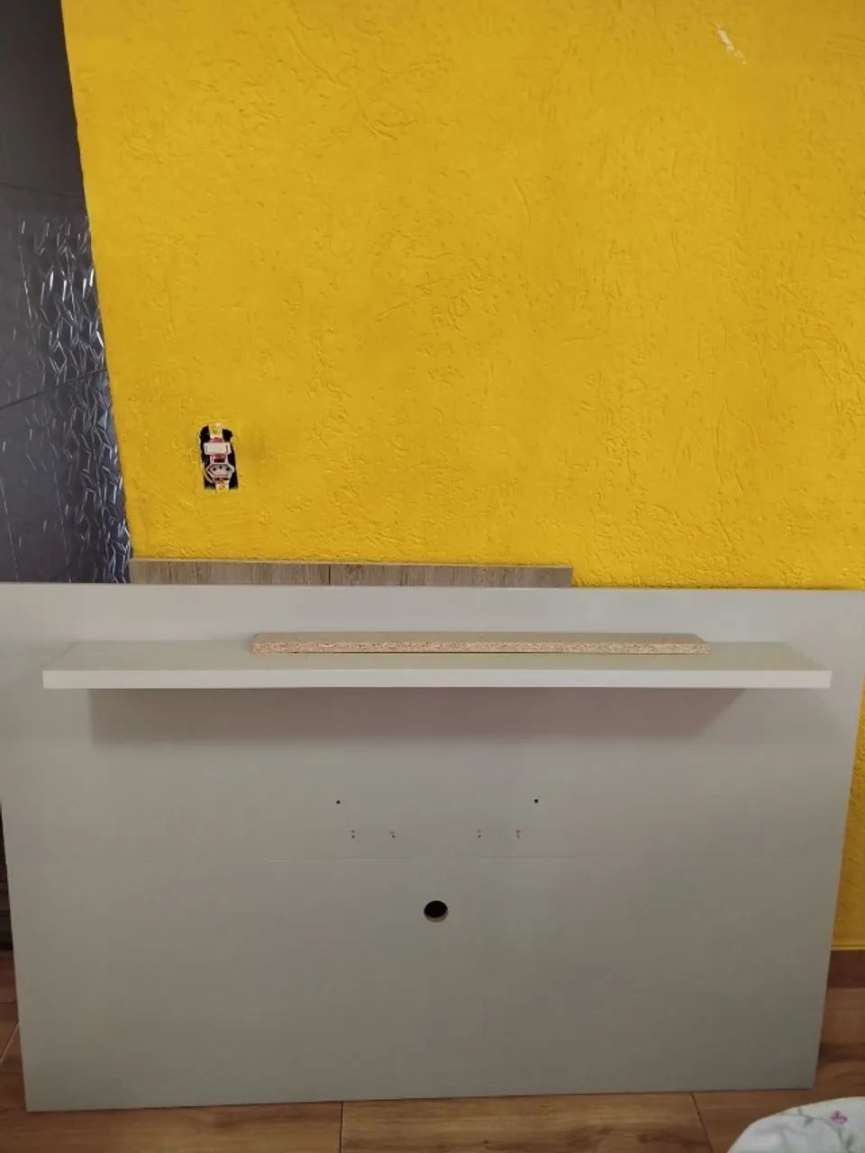 Painel e TV e rack