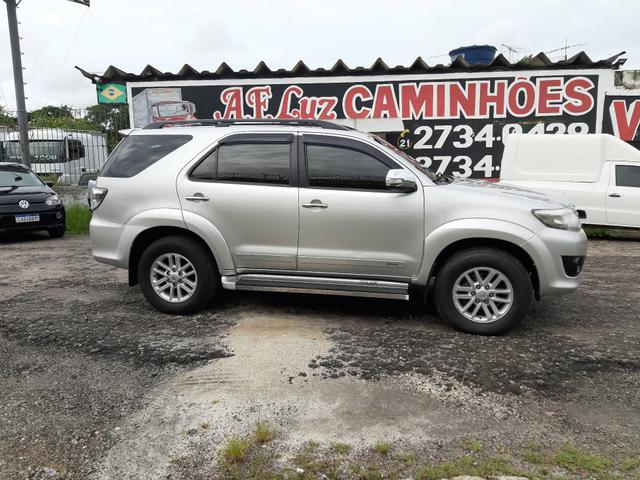 Toyota hilux sw4 sr top flex com gnv ano 2014 - Foto 4