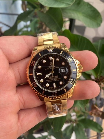 relogio rolex dourado