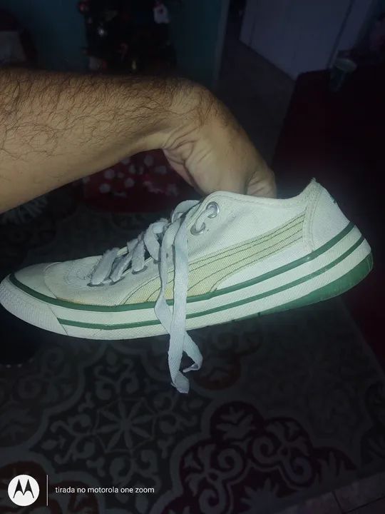 PAR DE TÊNIS MASCULINO PUMA ESTILO CHUTEIRA. 