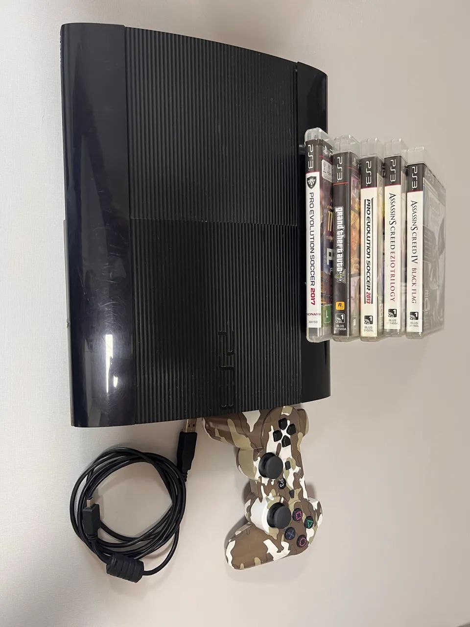PS3 Super Slim + 5 jogos - Foto 3