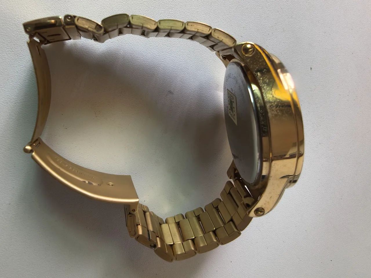 Relógio analógico dourado Touch  - Foto 4