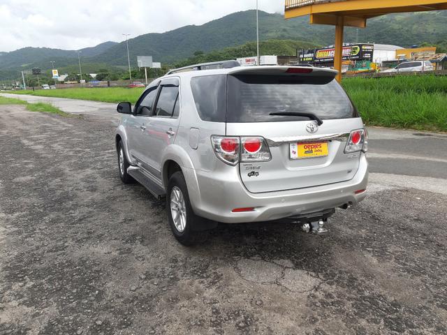 Toyota hilux sw4 sr top flex com gnv ano 2014 - Foto 6