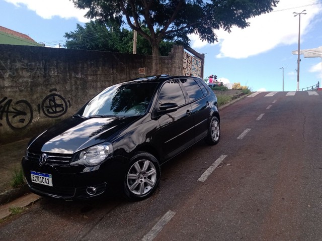 polo 1.6 com teto solar