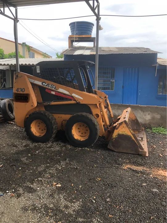 Mini carregadeira (bobcat)