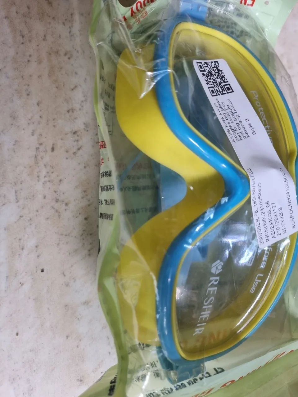 Oculos de sol com protetor de ouvido 