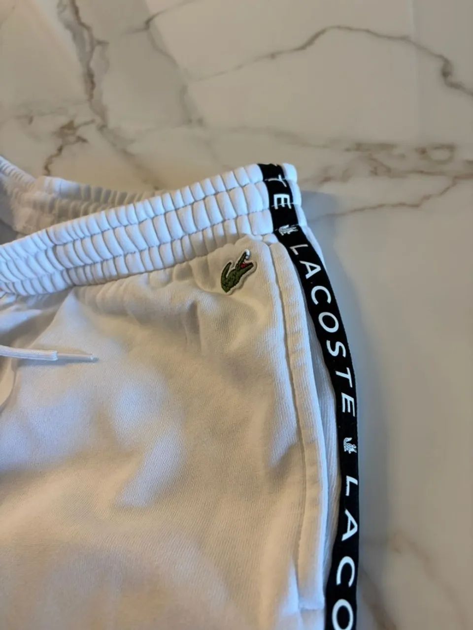 VENDO CALÇA LACOSTE ORIGINAL TAMANHO P - Foto 4